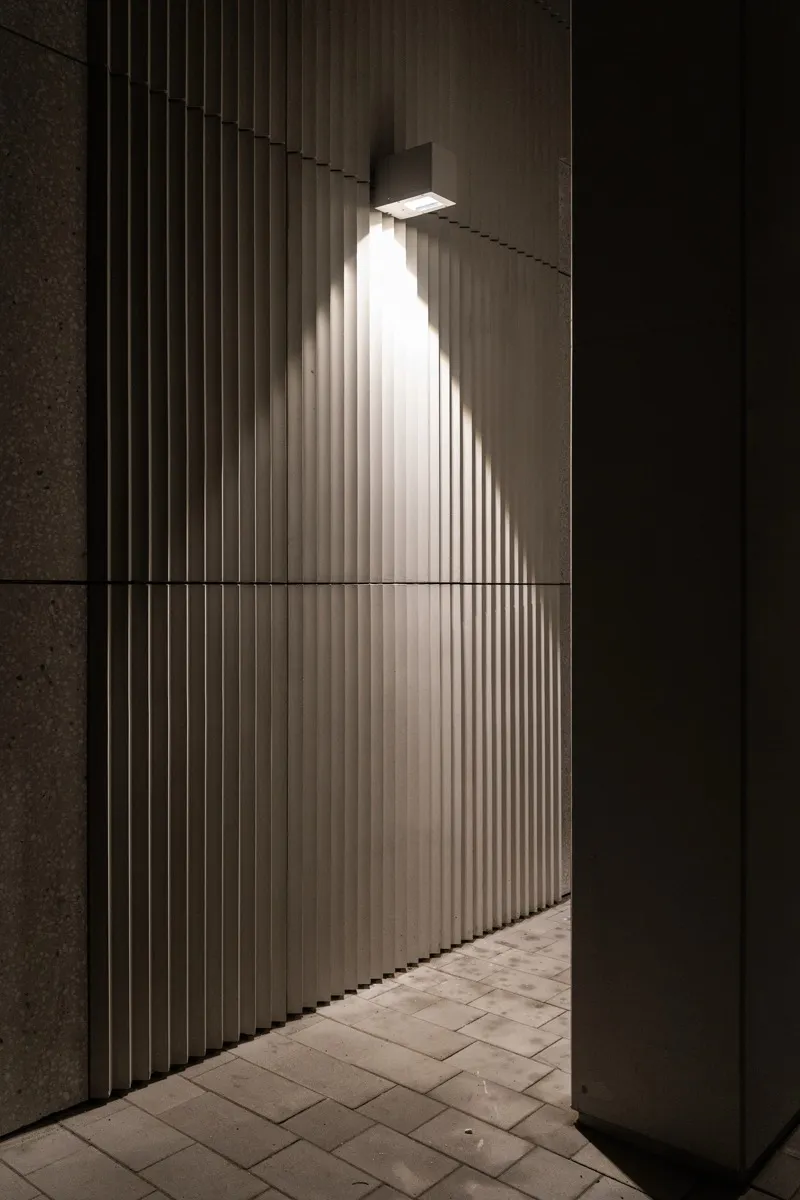 Fluted cladding in spot lighting